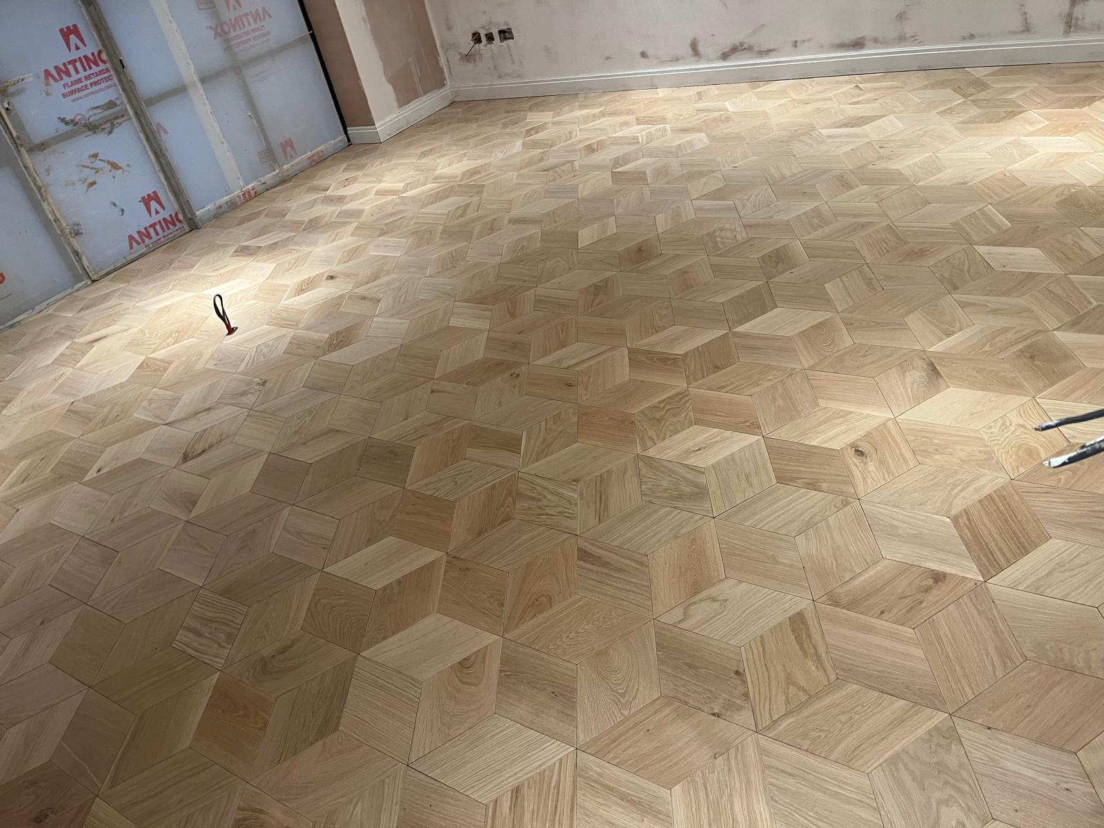 Geometric cube parquet floor installation