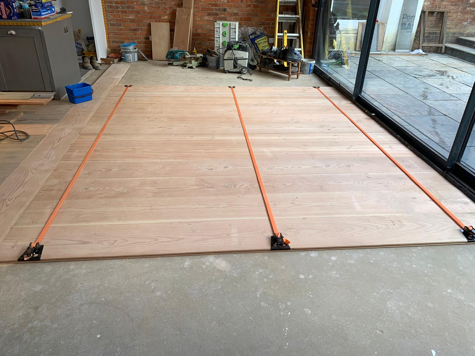 New pine flooring being laid